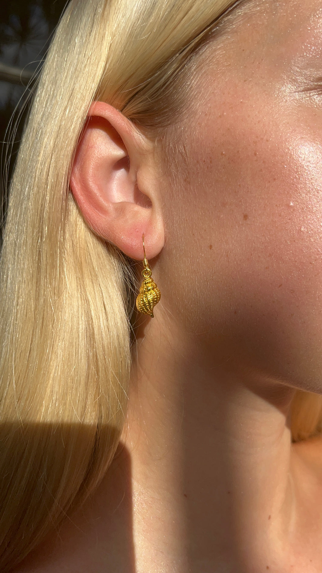 Gold shell earrings